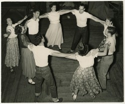 1940s 1950s guys and gals dancing in a circle