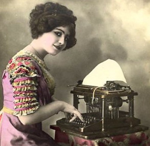 teens 20s gal at typewriter